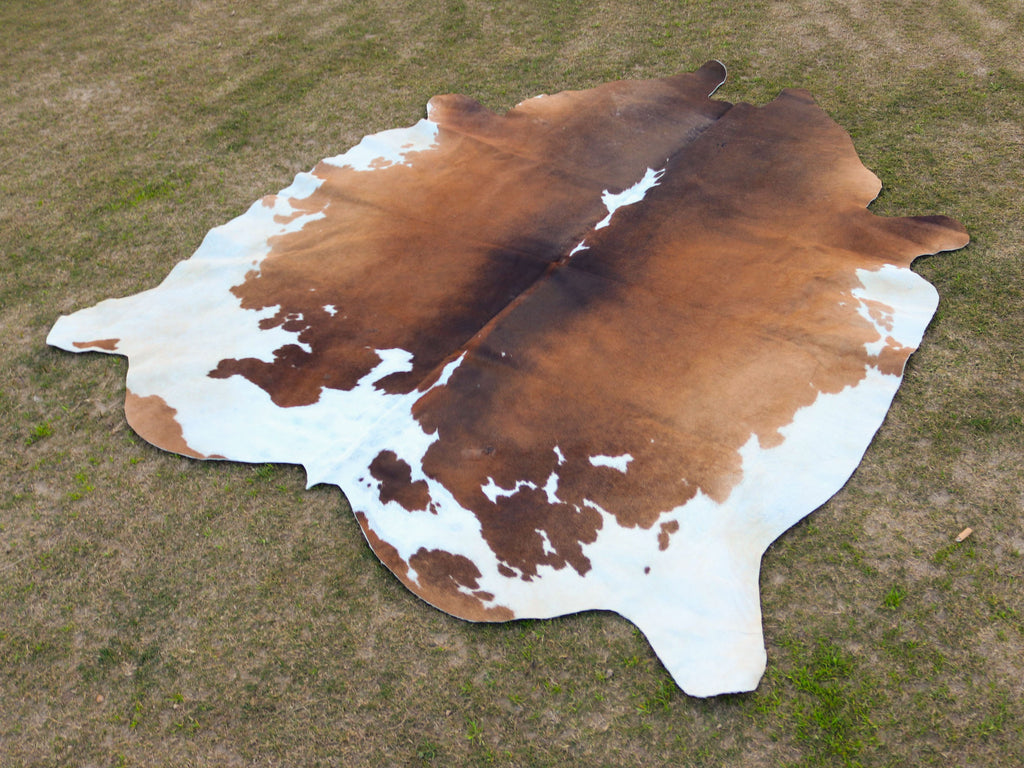 Tan Brown and White Cowhide Rug in Panda Print Style