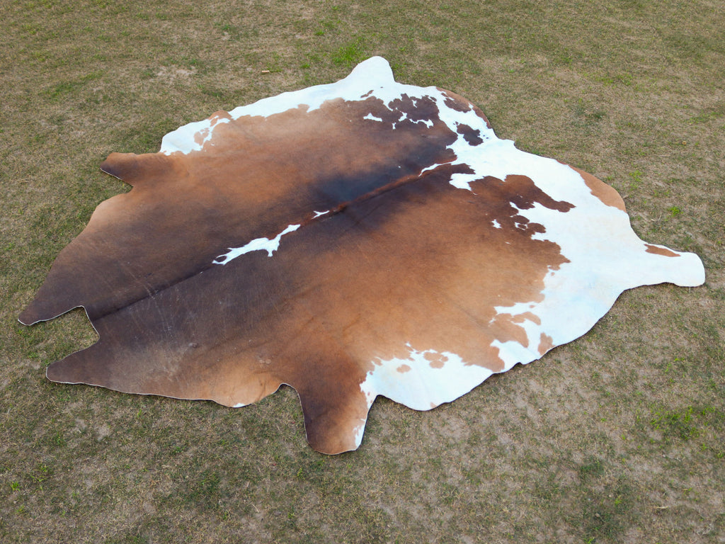 Tan Brown and White Cowhide Rug in Panda Print Style
