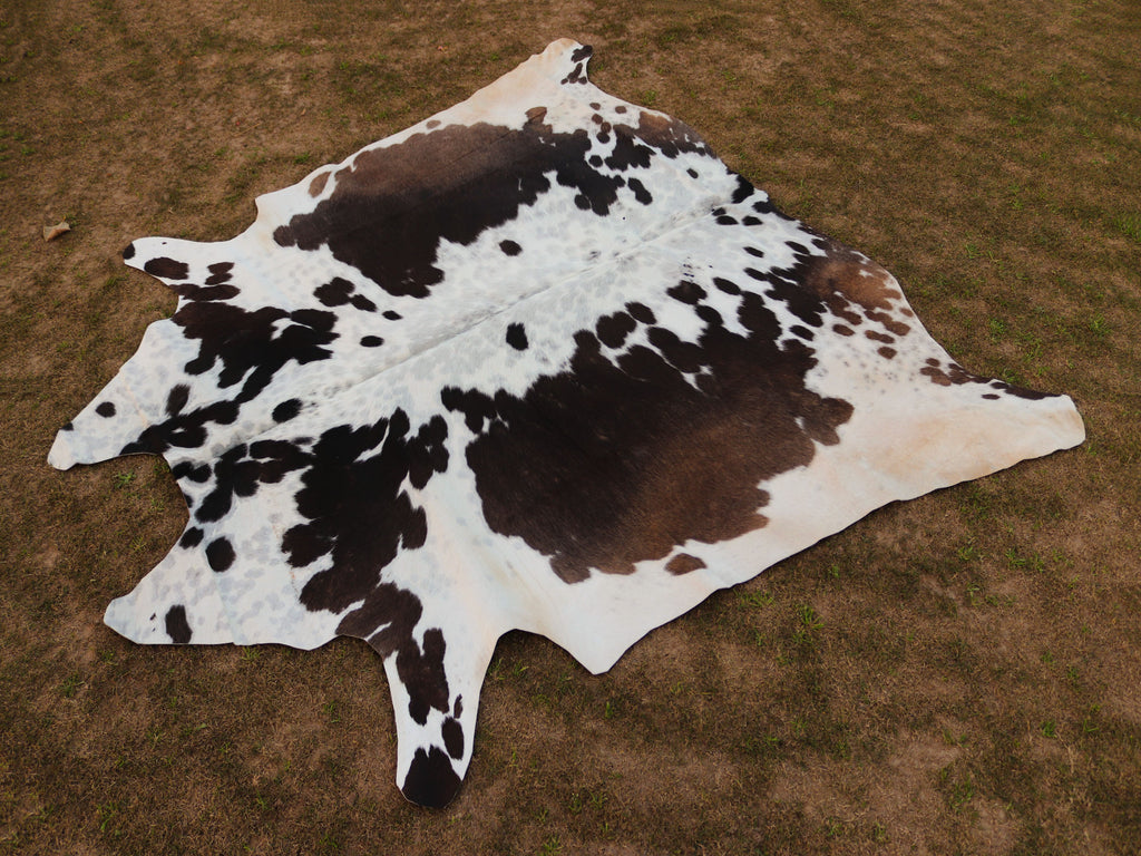 Chocolate Brown and White Cowhide Rug