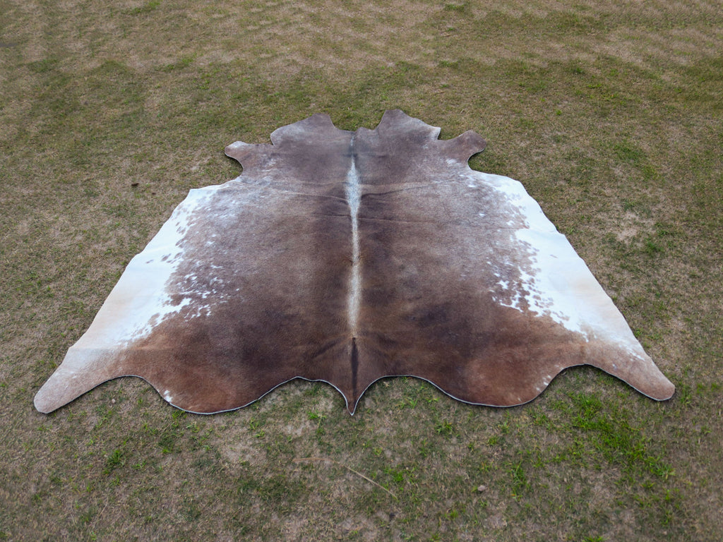 Greyish Beige and White Hereford Cowhide Rug