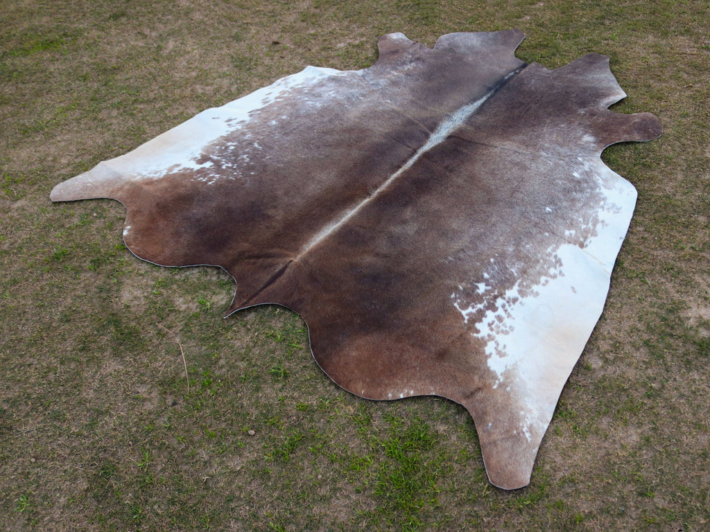 Greyish Beige and White Hereford Cowhide Rug
