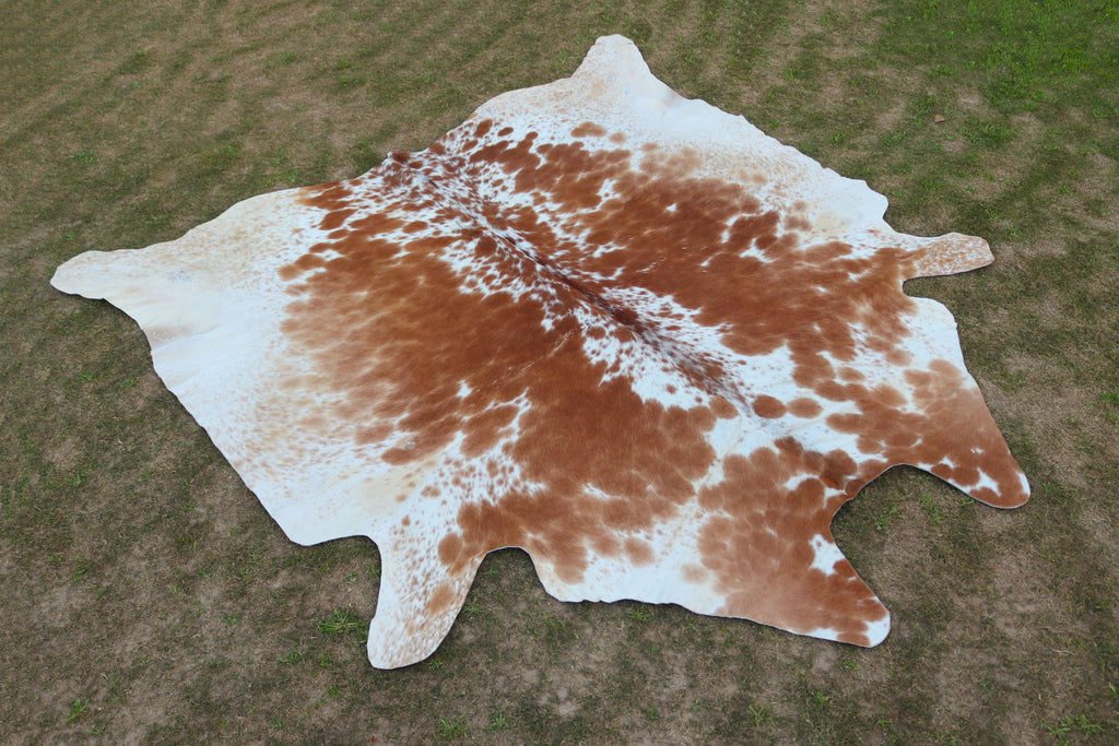 Tan Brown and White Speckled Cowhide Rug