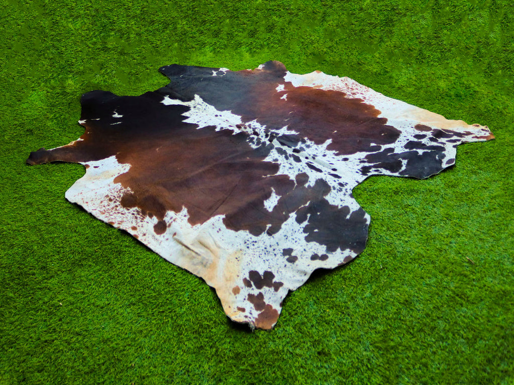 Tricolor Reddish Brown and White Cowhide Rug