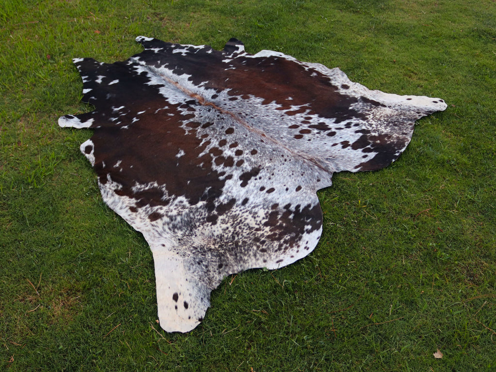 Reddish Brown and White Tricolor Speckled Cowhide Rug
