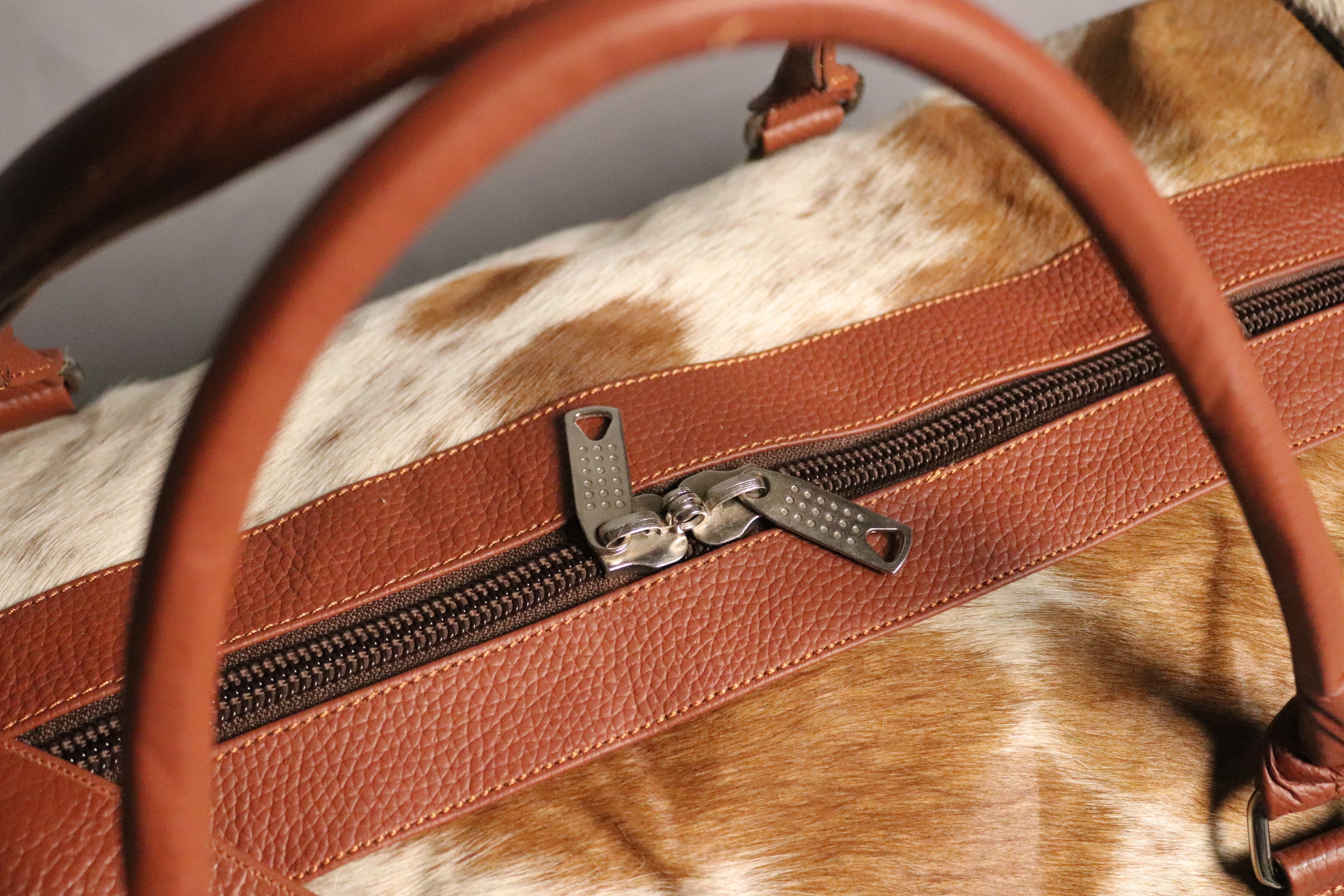 Cowhide Duffel Bag - Brown and White
